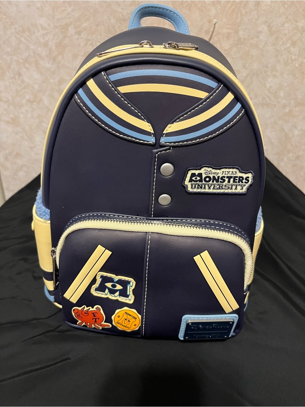 Loungefly Monsters University Navy, Yellow & Light Blue Mini Backpack